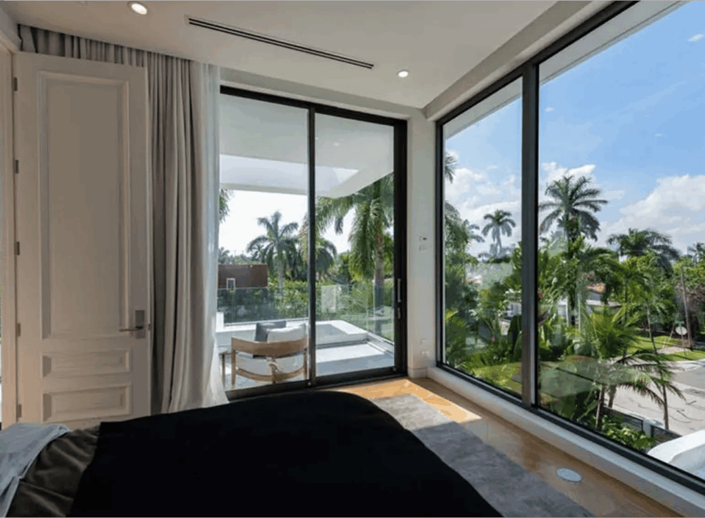 Second story home completed window installation job by Secure Windows & Doors. Includes an impact gallery window and impact sliding door out to a balcony. Job was completed on a new, modern South Florida home.