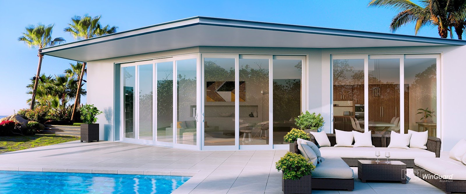 WinGuard hurricane proof windows installed by Secure Windows & Doors. This is a Miami home on the beach and are floor to ceiling windows that lead to the pool for best energy efficiency.