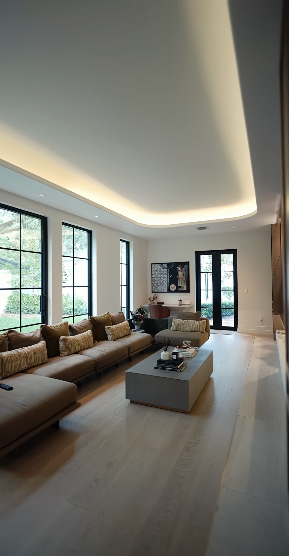 Side view photo of a South Florida Luxury home with impact windows installed in the living room